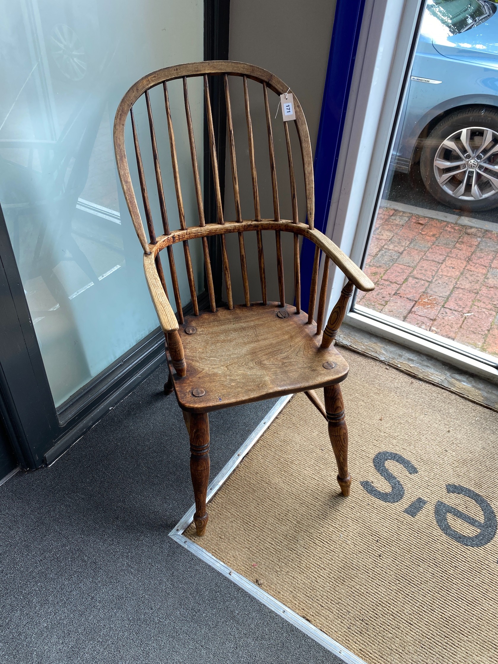 A Victorian ash comb back Windsor armchair, width 54cm, height 108cm